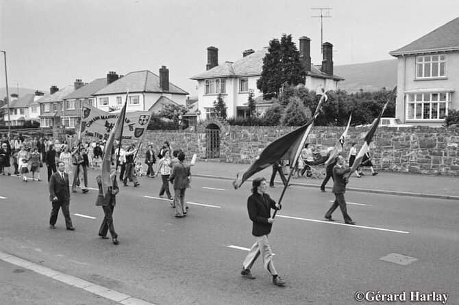 2 hours Belfast Original Drivers The Troubles Black Taxi Tour - Falls Road, Bobby Sands mural, and the 1981 hunger strike context
