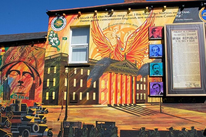 Award Winning Express 2 Hours Belfast Black Taxi/Cab tours - Stop 3: Divis Street international mural wall and the Divis Flats backdrop