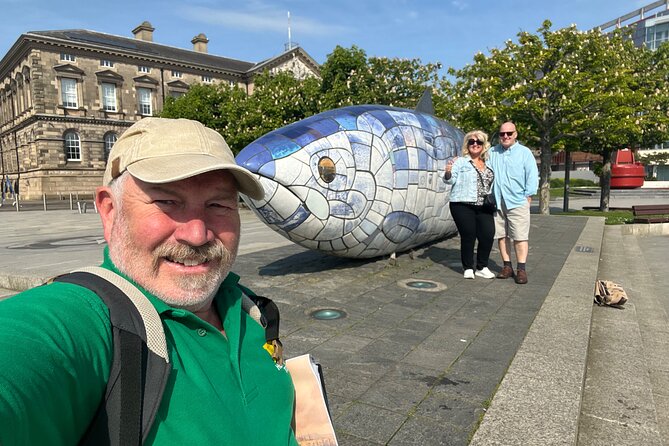 Best of Belfast Driving Taxi Tour with Political Murals - Getting picked up at Visit Belfast and settling into the Seat Alhambra