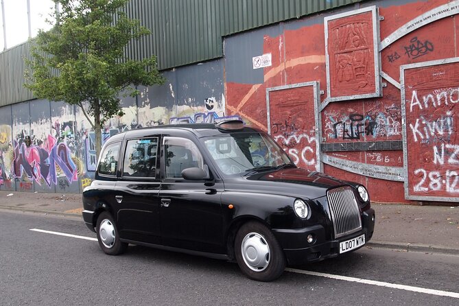 Black Taxi Mural "Tour Like A Local" - Stop 3: Shankill Road murals and the memorial garden