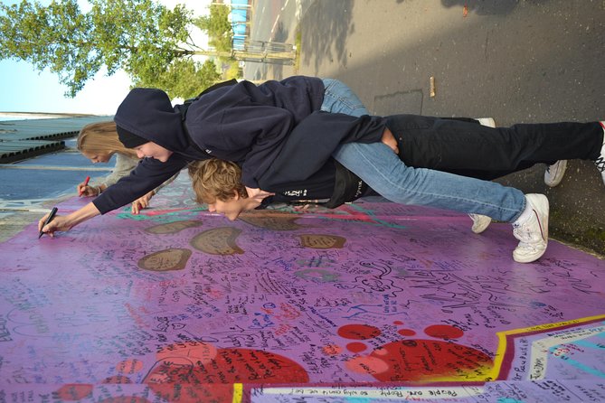 Famous Private Belfast Troubles Taxi Tour Original Drivers 2hr - Stop 2: The Peace Wall, a long route and a chance to sign your name