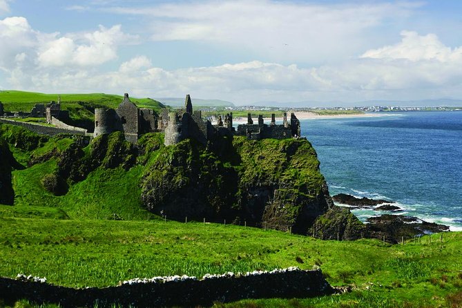 Giant’s Causeway and Titanic Experience from Belfast Port - Dunluce Castle photo stop: dramatic cliffs and a movie tie-in