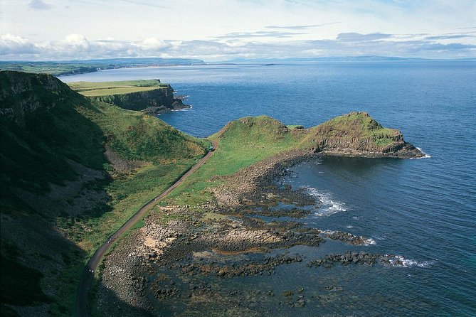 Giant's Causeway and Whisky Distillery tasting tour from Belfast - Dunluce Castle, 5 minutes to grab the photos