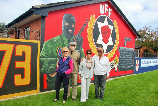 N0 1 Belfast black cab Irish and British mural 2hr private tour - Stop 1: Bombay Street and the Peacewalls, where 1969 marks the start