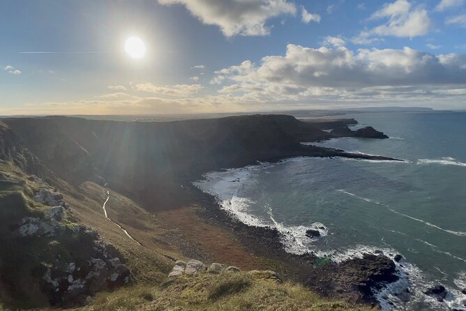 Private Belfast Mural & Giant's Causeway Tour from Belfast (2 in 1) - Ballintoy Harbour and The Dark Hedges: Game of Thrones without the tourist fog