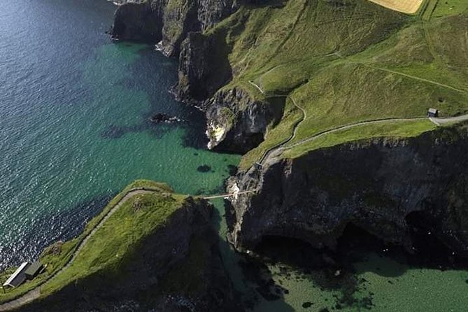 Private Luxury Mercedes Rope Bridge Giants Causeway Coastal Tour - Dunluce Castle ruins, cliffs, and the Greyjoy connection