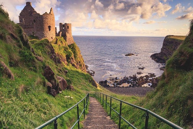 (Small Group) Shore Tour from Belfast: Giant's Causeway and Belfast Day Trip - Dunluce Castle ruins: a fast cliff-edge photo break